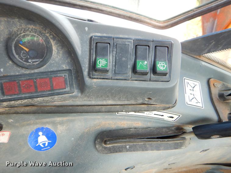 image for item EZ9932 1996 New Holland 575E backhoe