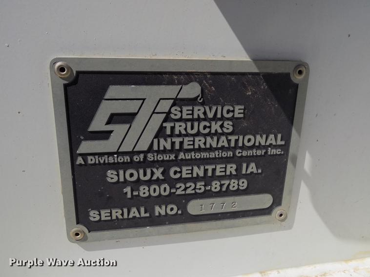 image for item FA9616 2003 Ford F550 utility truck with crane