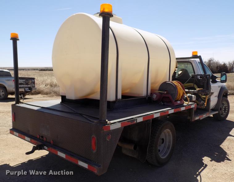 image for item FA9618 2006 Ford F550 Super Duty XL flatbed truck