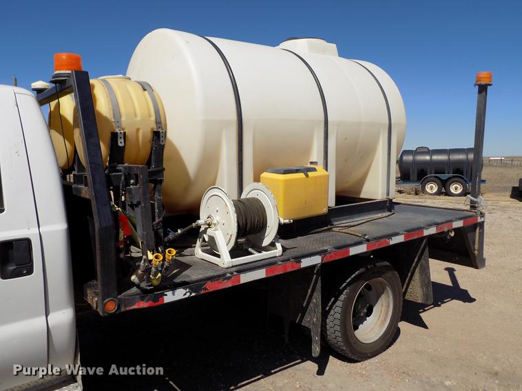 image for item FA9618 2006 Ford F550 Super Duty XL flatbed truck