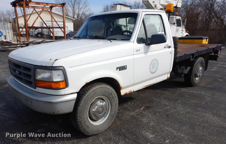 image for item DC8734 1997 Ford F250 flatbed pickup truck