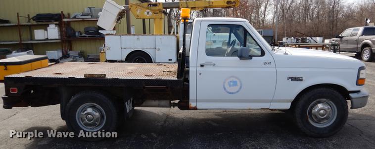 image for item DC8734 1997 Ford F250 flatbed pickup truck