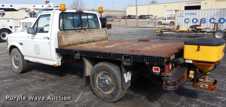 image for item DC8734 1997 Ford F250 flatbed pickup truck