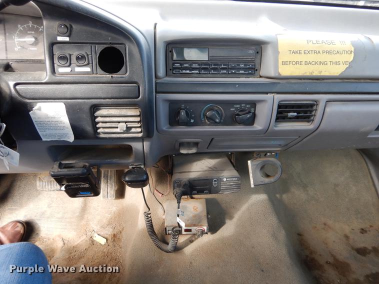 image for item DC8734 1997 Ford F250 flatbed pickup truck