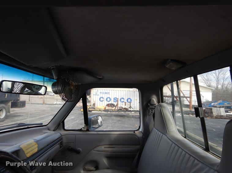 image for item DC8734 1997 Ford F250 flatbed pickup truck