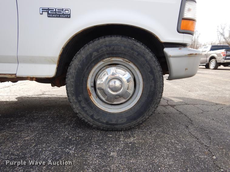 image for item DC8734 1997 Ford F250 flatbed pickup truck