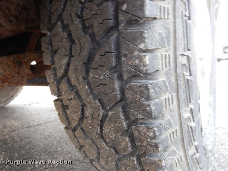 image for item DC8734 1997 Ford F250 flatbed pickup truck