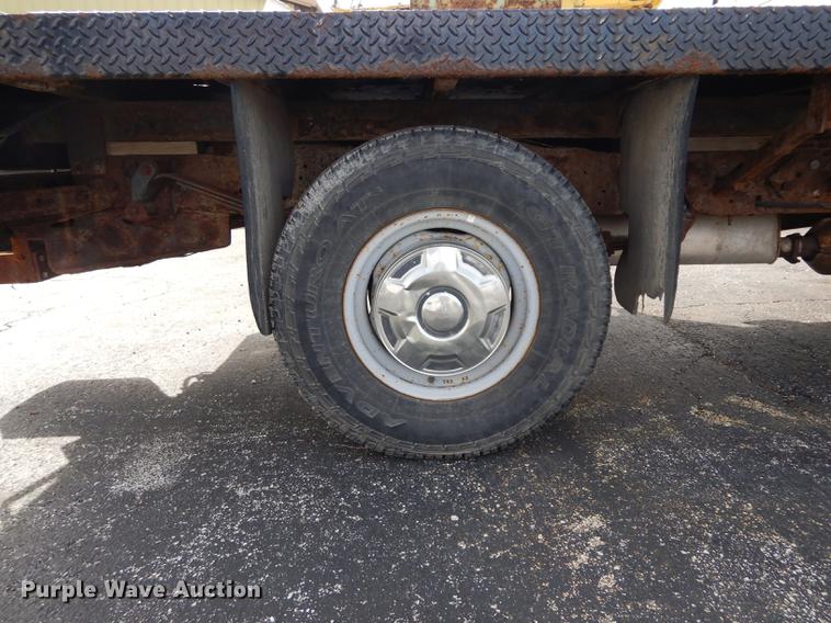 image for item DC8734 1997 Ford F250 flatbed pickup truck