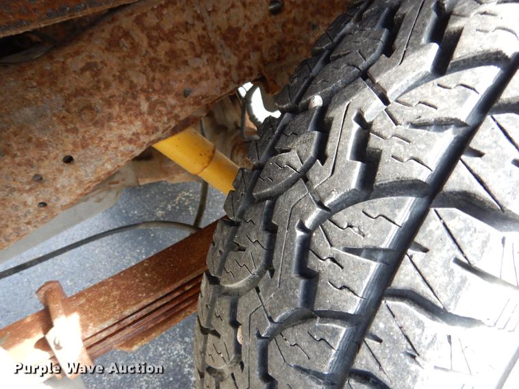 image for item DC8734 1997 Ford F250 flatbed pickup truck