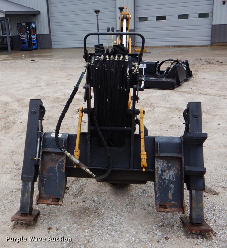 image for item DE6082 Caterpillar BH30 skid steer backhoe attachment