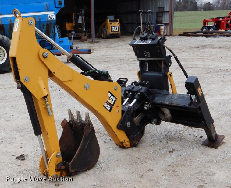 image for item DE6082 Caterpillar BH30 skid steer backhoe attachment