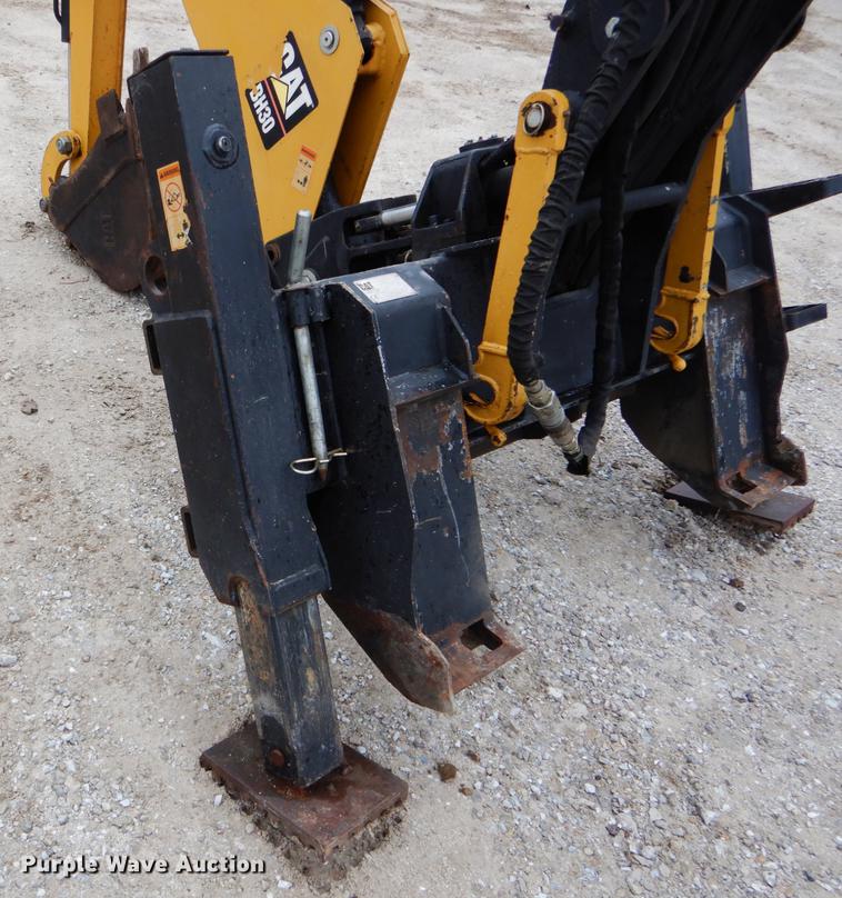 image for item DE6082 Caterpillar BH30 skid steer backhoe attachment