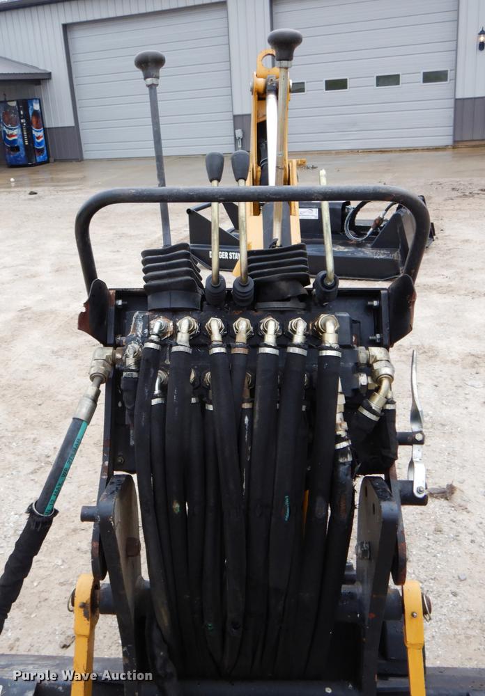 image for item DE6082 Caterpillar BH30 skid steer backhoe attachment