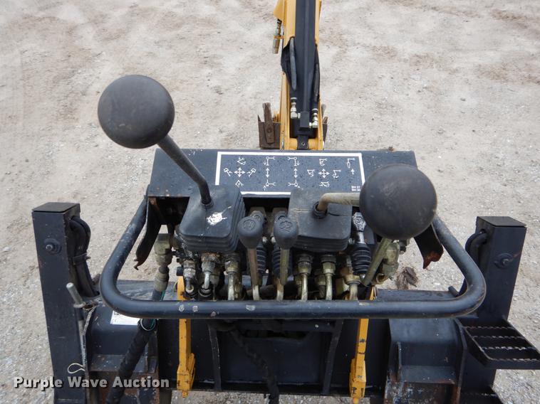 image for item DE6082 Caterpillar BH30 skid steer backhoe attachment