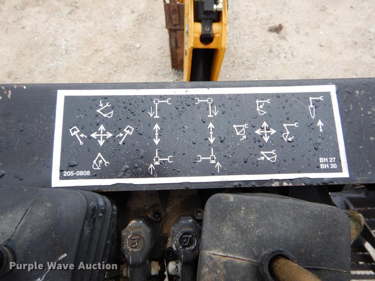 image for item DE6082 Caterpillar BH30 skid steer backhoe attachment