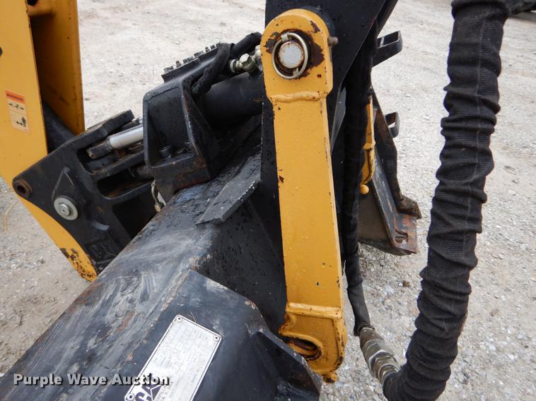 image for item DE6082 Caterpillar BH30 skid steer backhoe attachment