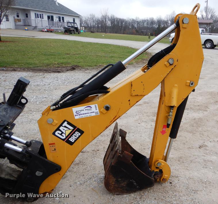 image for item DE6082 Caterpillar BH30 skid steer backhoe attachment