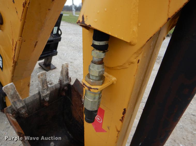 image for item DE6082 Caterpillar BH30 skid steer backhoe attachment