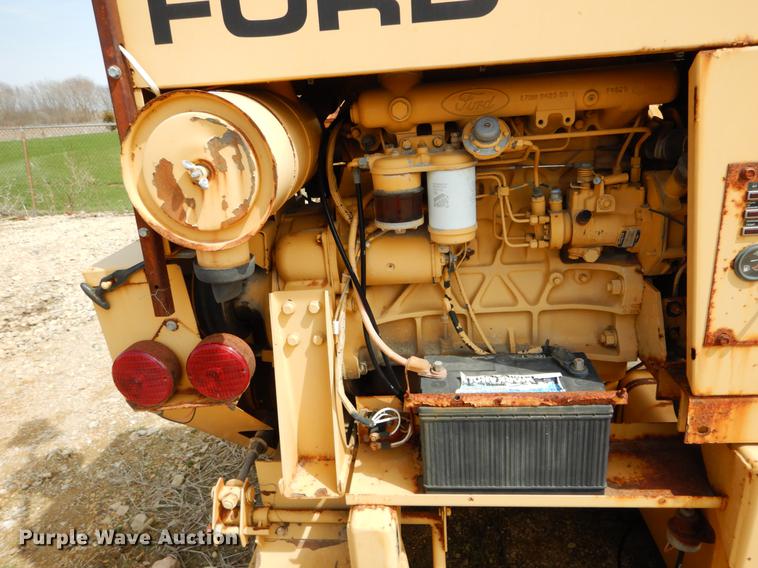 image for item DE8309 Ford 710 leaf loader