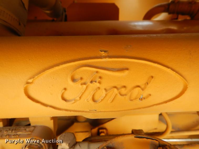 image for item DE8309 Ford 710 leaf loader