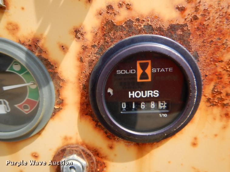 image for item DE8309 Ford 710 leaf loader