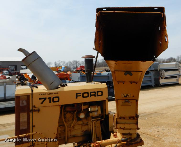 image for item DE8309 Ford 710 leaf loader