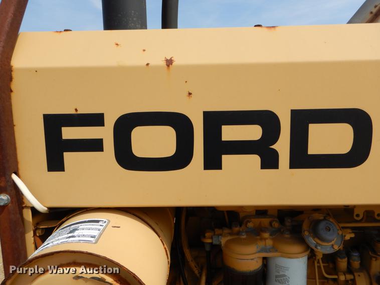 image for item DE8309 Ford 710 leaf loader