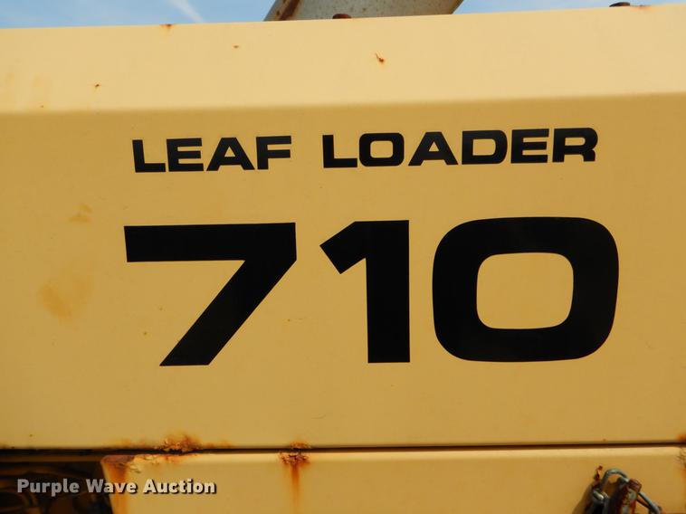 image for item DE8309 Ford 710 leaf loader