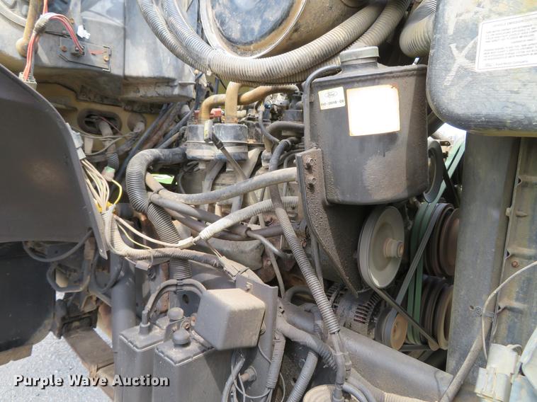 image for item DG3946 1992 Ford F700 flatbed truck