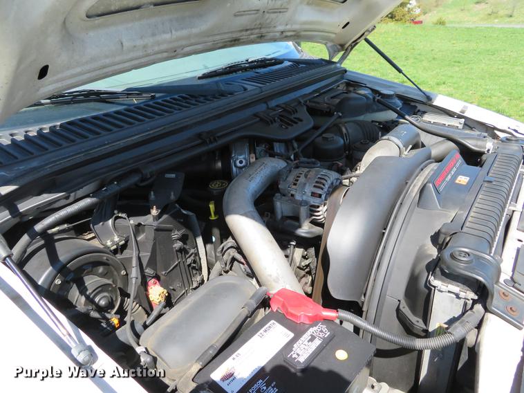 image for item DG3955 2004 Ford F450 Super Duty Crew Cab utility bed truck