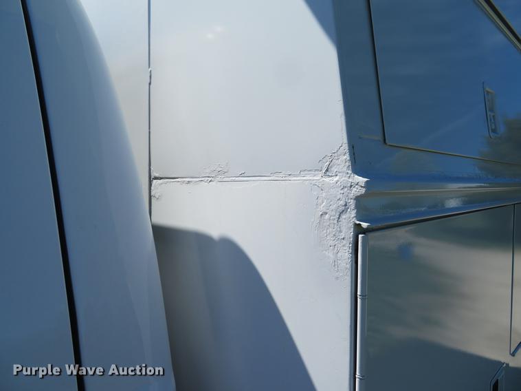 image for item DG3955 2004 Ford F450 Super Duty Crew Cab utility bed truck