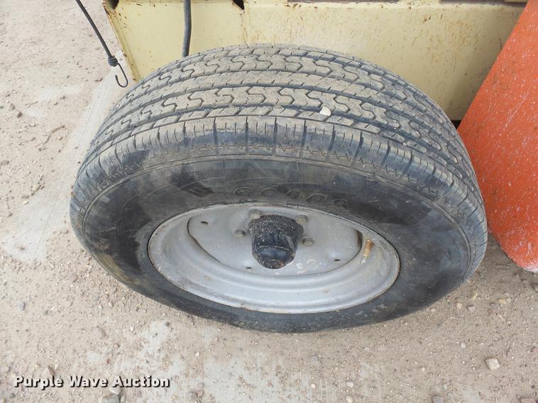 image for item DX9174 2001 JLG 3369 rough terrain scissor lift