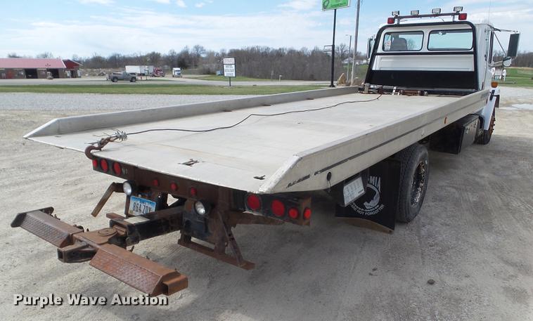 image for item EM9146 2001 Freightliner FL60 rollback truck