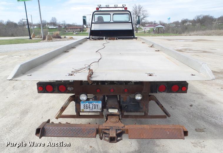 image for item EM9146 2001 Freightliner FL60 rollback truck