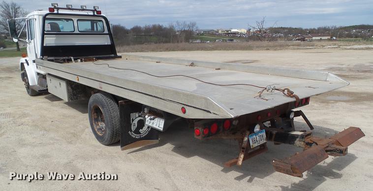 image for item EM9146 2001 Freightliner FL60 rollback truck