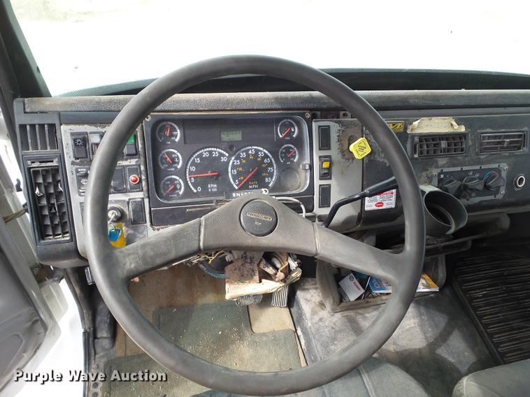 image for item EM9146 2001 Freightliner FL60 rollback truck