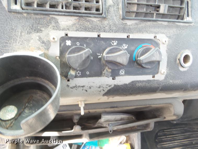 image for item EM9146 2001 Freightliner FL60 rollback truck