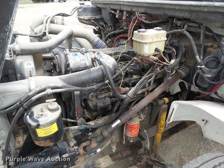 image for item EM9146 2001 Freightliner FL60 rollback truck