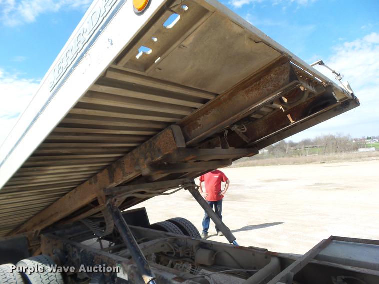 image for item EM9146 2001 Freightliner FL60 rollback truck