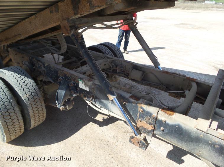 image for item EM9146 2001 Freightliner FL60 rollback truck