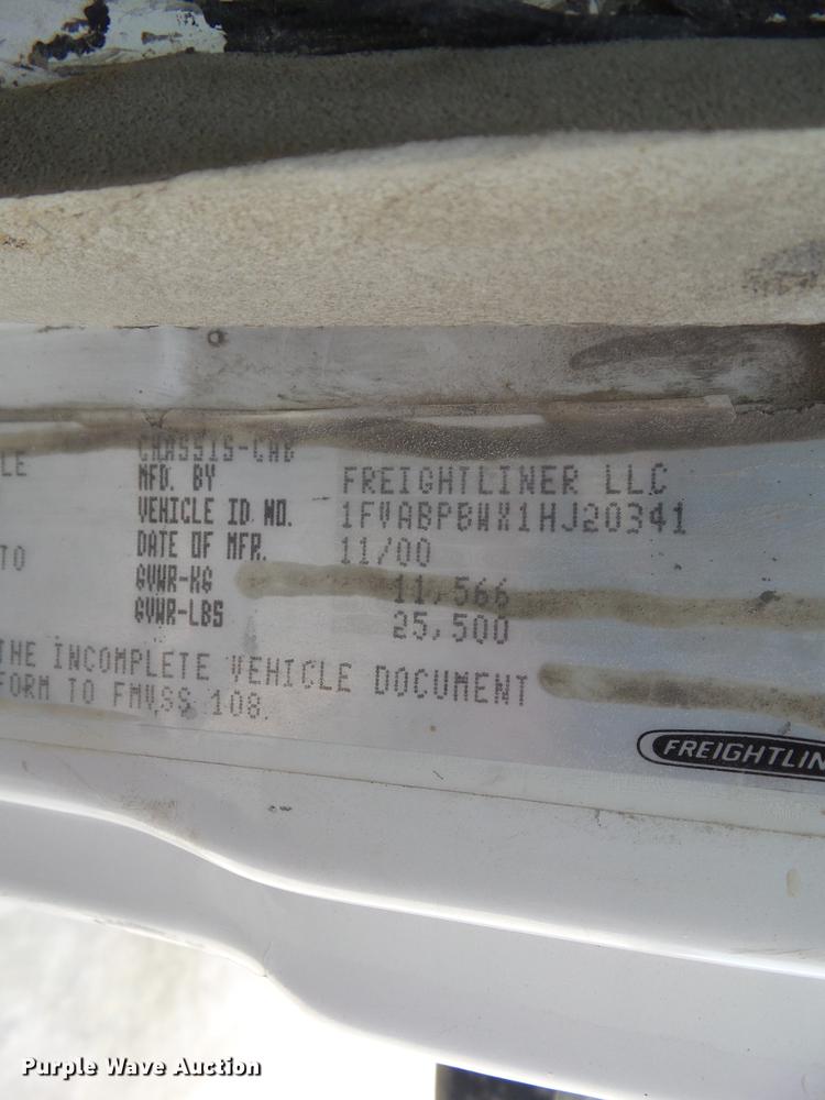 image for item EM9146 2001 Freightliner FL60 rollback truck