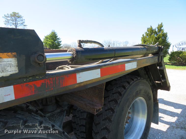 image for item DG3958 2000 Volvo WB roll-off container truck