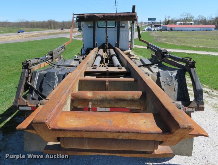 image for item DG3958 2000 Volvo WB roll-off container truck