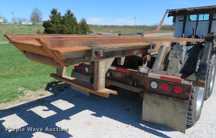 image for item DG3958 2000 Volvo WB roll-off container truck