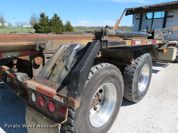 image for item DG3958 2000 Volvo WB roll-off container truck