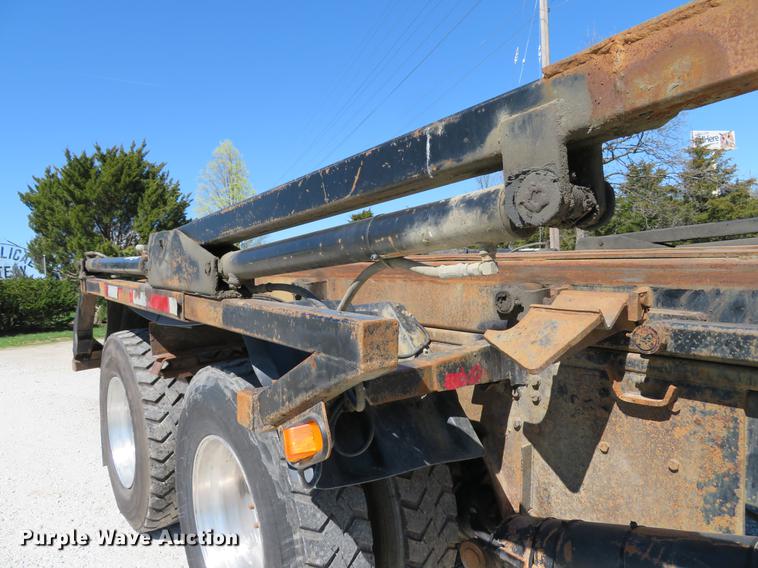 image for item DG3958 2000 Volvo WB roll-off container truck