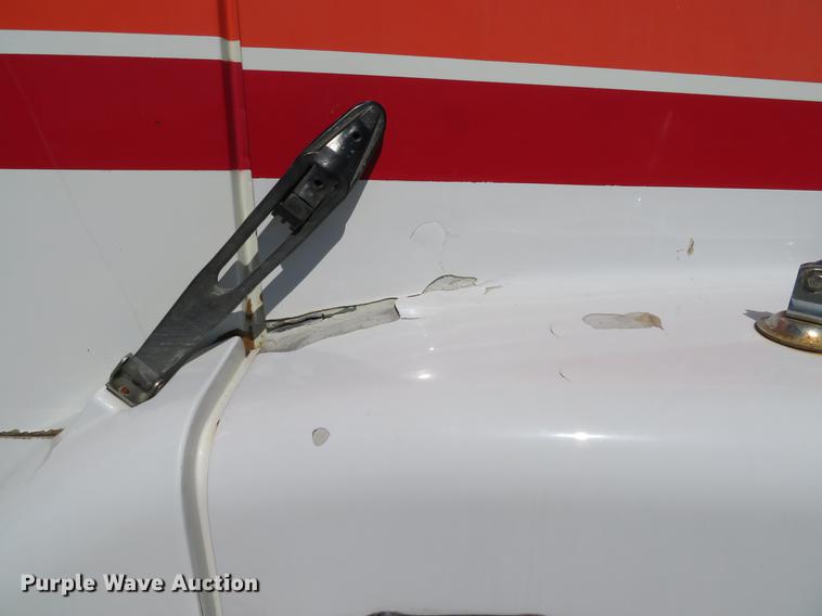 image for item DG3958 2000 Volvo WB roll-off container truck