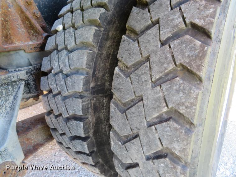 image for item DG3958 2000 Volvo WB roll-off container truck