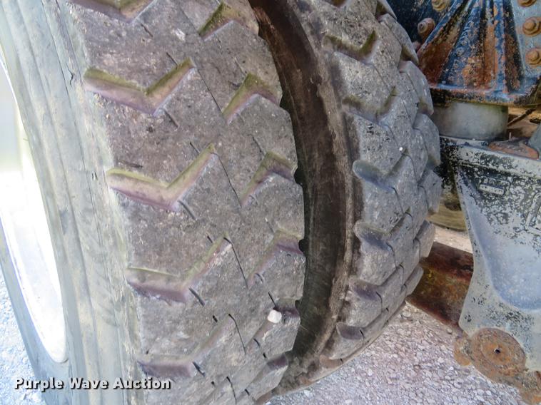 image for item DG3958 2000 Volvo WB roll-off container truck