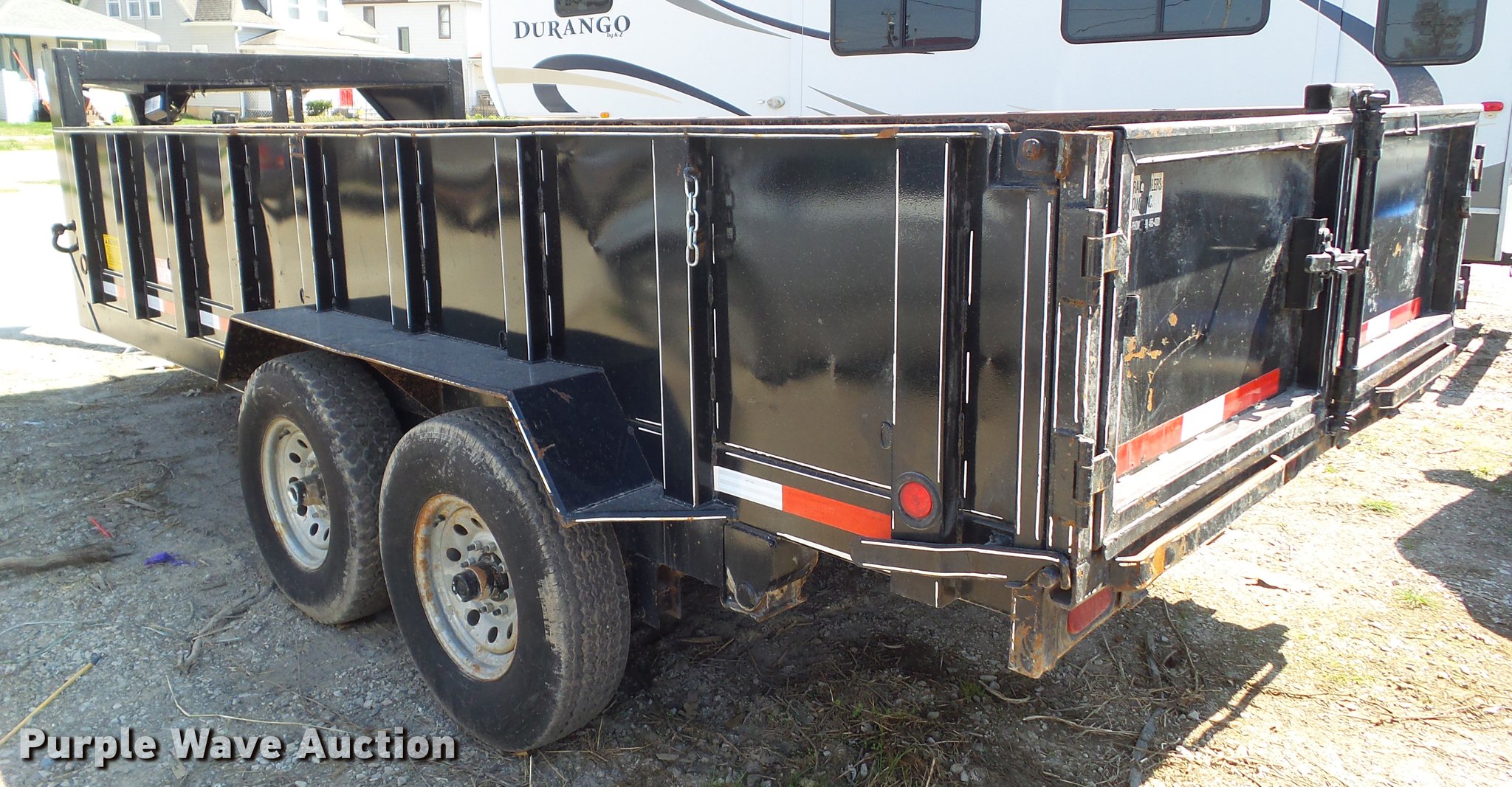 2010 Chaparral dump trailer in Ottumwa, IA Item EM9151 sold Purple Wave